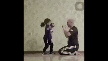 butt kick wow GIF